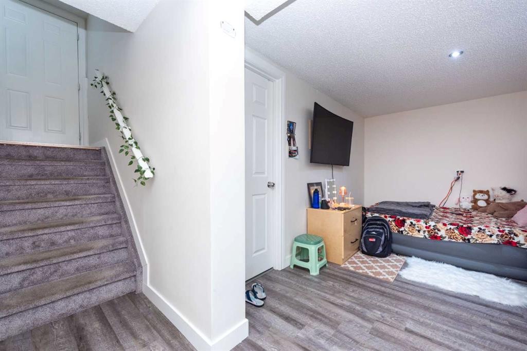 39 Tararidge Drive Ne, Calgary, AB - Indoor Photo Showing Other Room