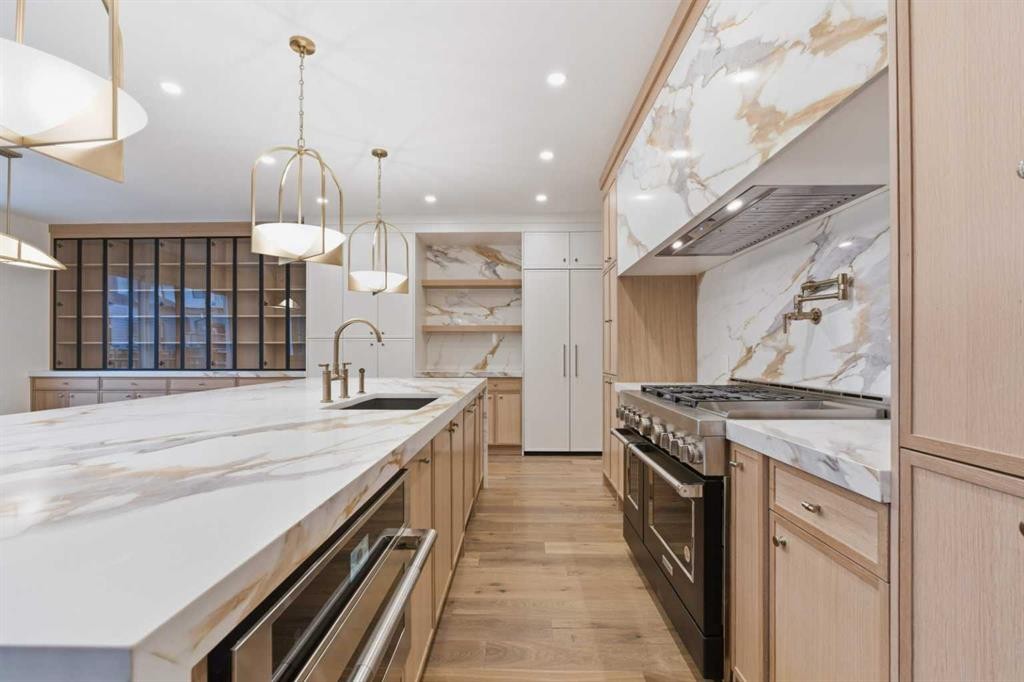 356 Greenwich Drive Nw, Calgary, AB - Indoor Photo Showing Kitchen With Upgraded Kitchen
