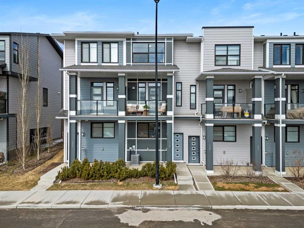 126 Seton Passage Se, Calgary, AB - Outdoor With Balcony With Facade