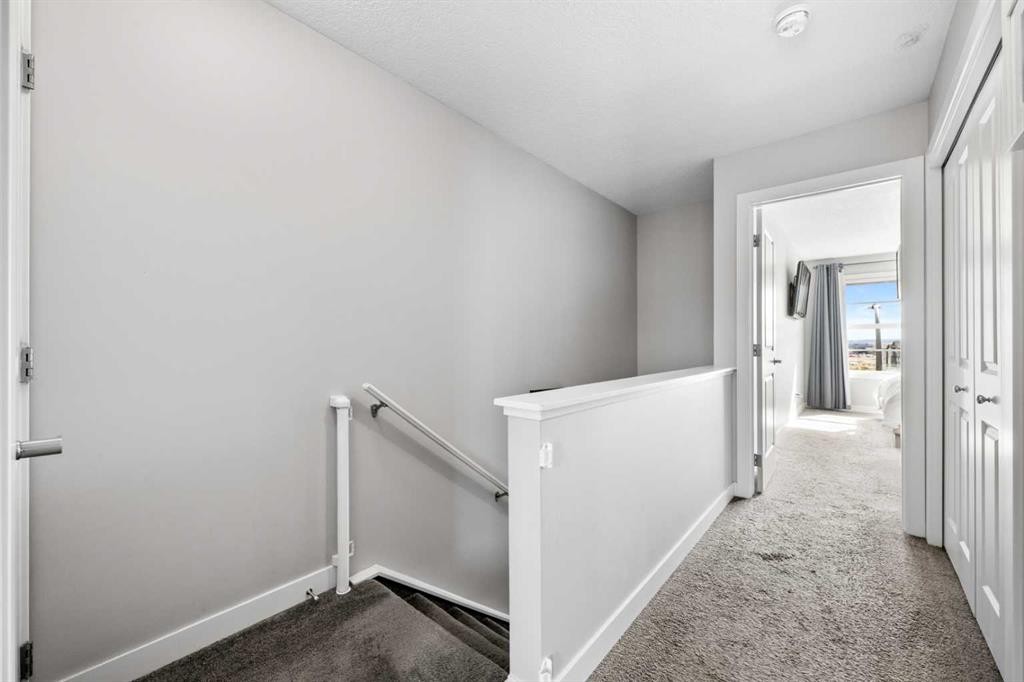 126 Seton Passage Se, Calgary, AB - Indoor Photo Showing Other Room