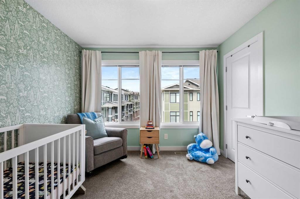 126 Seton Passage Se, Calgary, AB - Indoor Photo Showing Bedroom