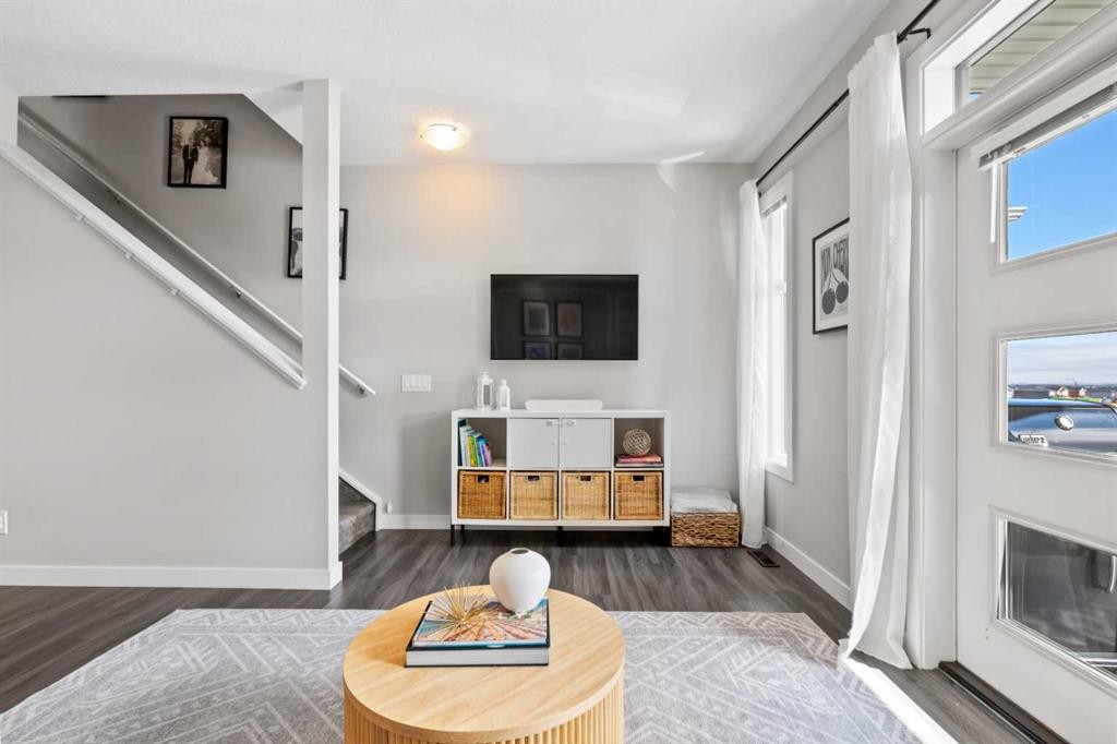 126 Seton Passage Se, Calgary, AB - Indoor Photo Showing Living Room With Fireplace