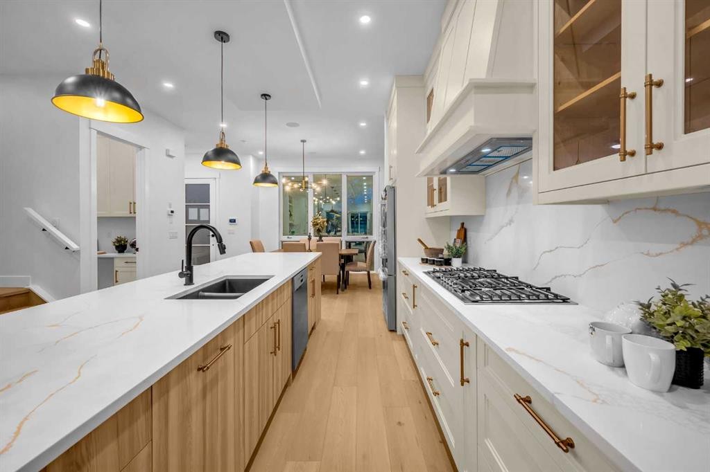 2435 52 Avenue Sw, Calgary, AB - Indoor Photo Showing Kitchen With Double Sink With Upgraded Kitchen