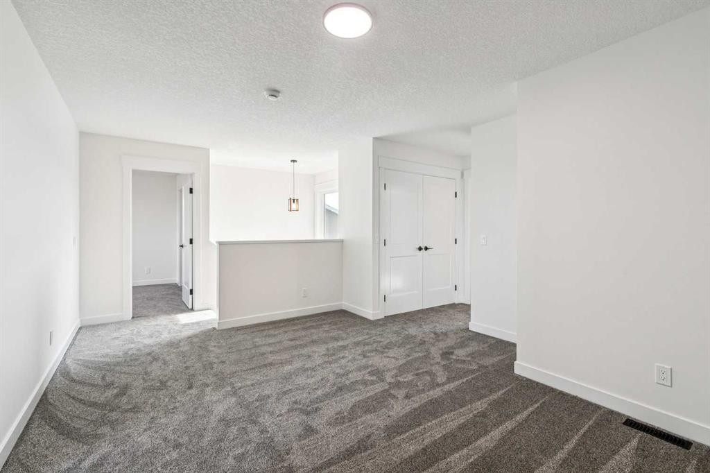 26A Poplar Ridge Close, Didsbury, AB - Indoor Photo Showing Other Room