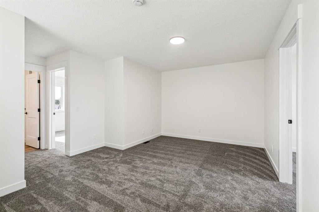 26A Poplar Ridge Close, Didsbury, AB - Indoor Photo Showing Other Room