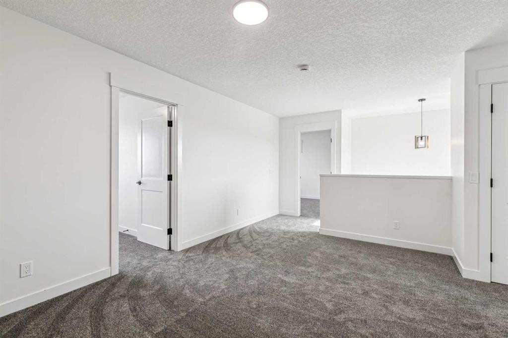 26A Poplar Ridge Close, Didsbury, AB - Indoor Photo Showing Other Room