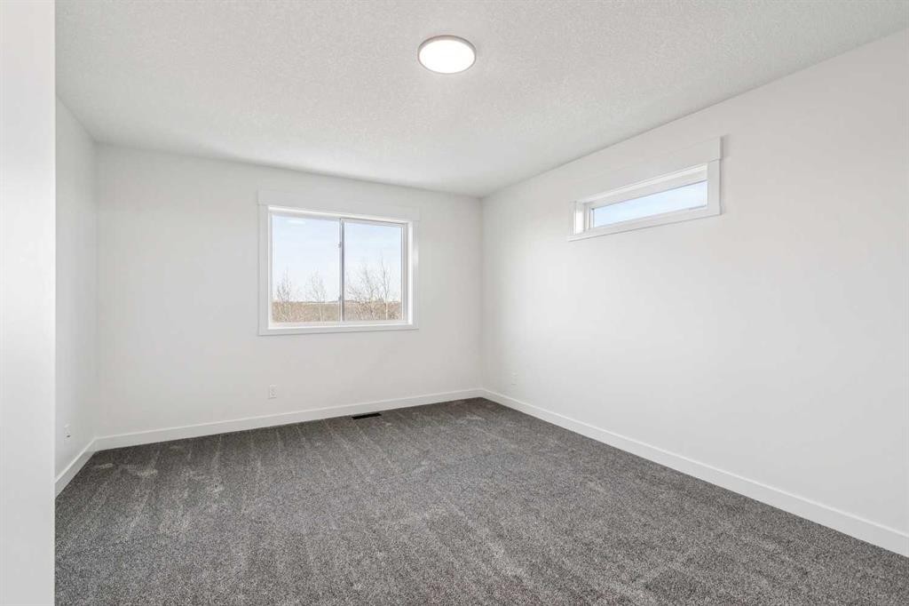 26A Poplar Ridge Close, Didsbury, AB - Indoor Photo Showing Other Room