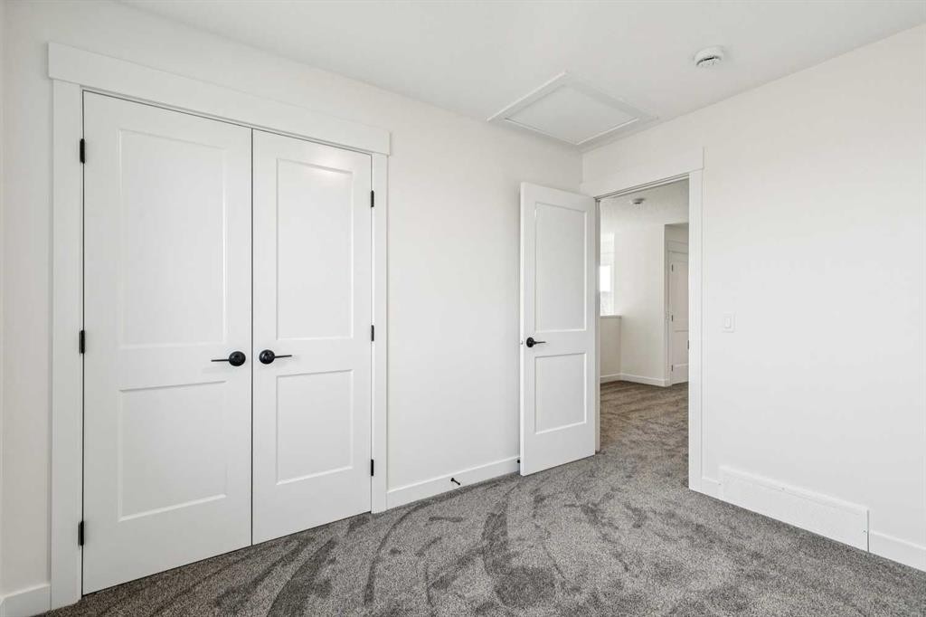 26A Poplar Ridge Close, Didsbury, AB - Indoor Photo Showing Other Room
