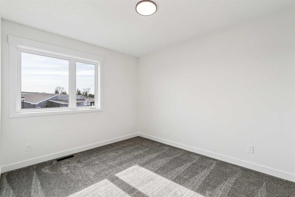 26A Poplar Ridge Close, Didsbury, AB - Indoor Photo Showing Other Room