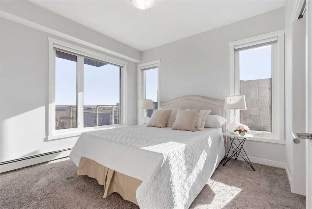301-71 Shawnee Common Sw, Calgary, AB - Indoor Photo Showing Bedroom