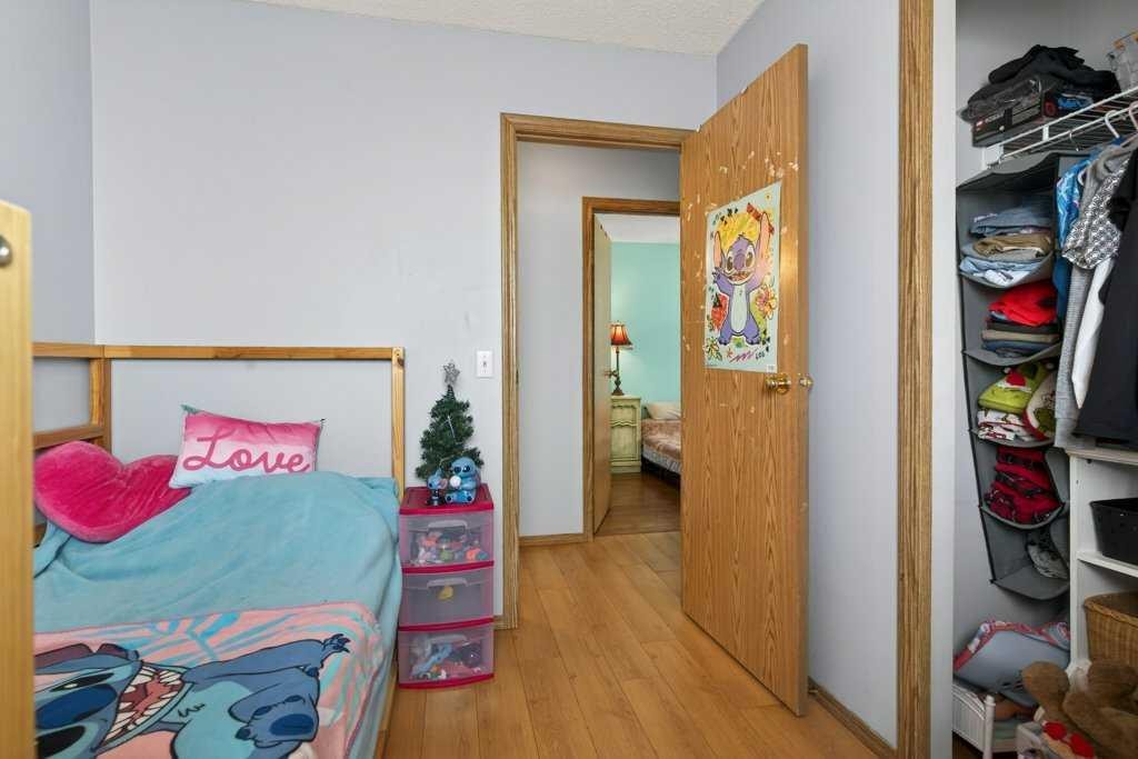 173 Martin Crossing Crescent Ne, Calgary, AB - Indoor Photo Showing Bedroom