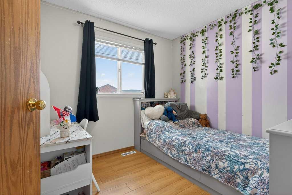 173 Martin Crossing Crescent Ne, Calgary, AB - Indoor Photo Showing Bedroom