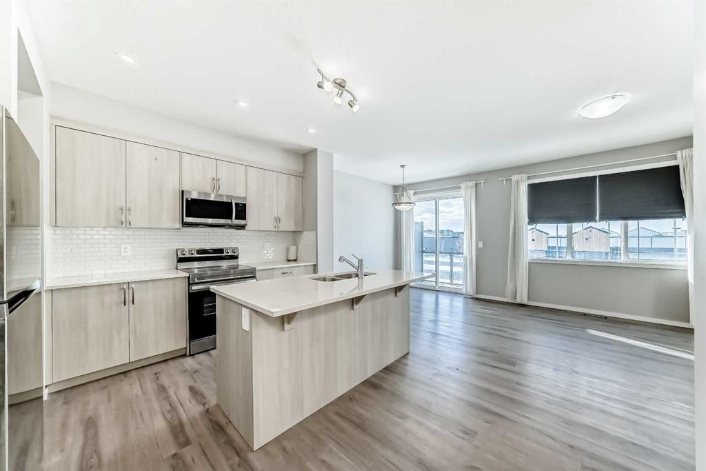 224 Carringham Way Nw, Calgary, AB - Indoor Photo Showing Kitchen With Stainless Steel Kitchen With Upgraded Kitchen