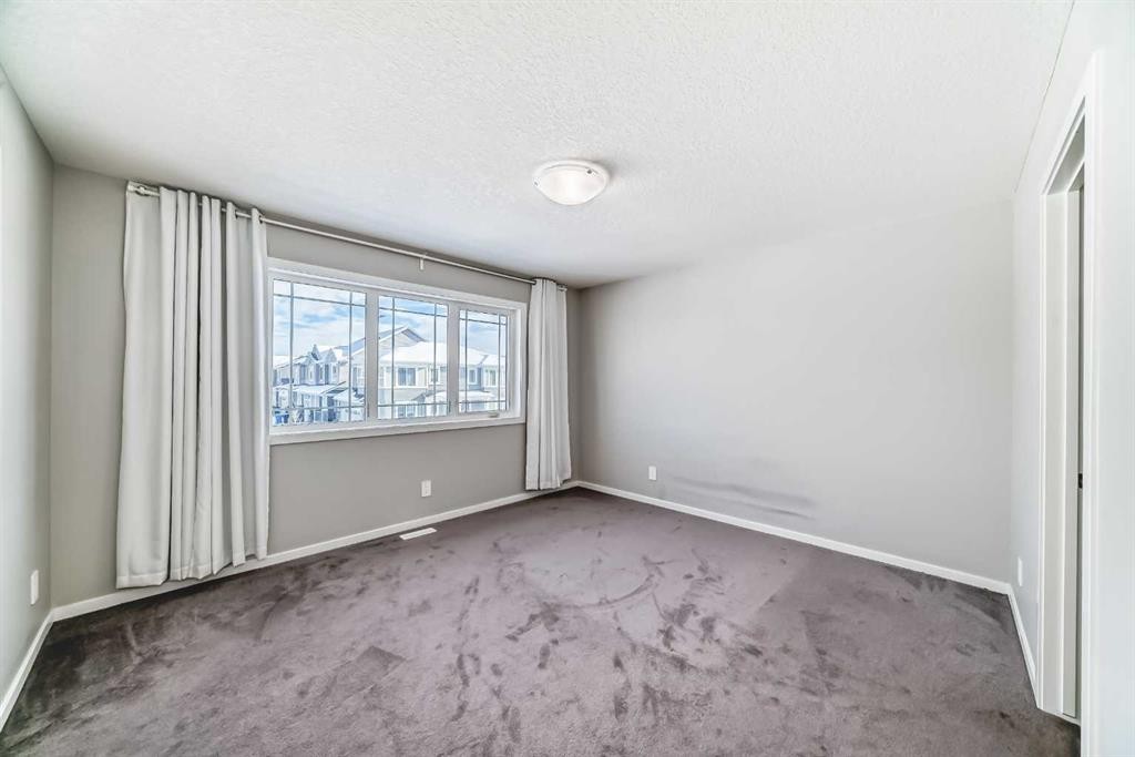 224 Carringham Way Nw, Calgary, AB - Indoor Photo Showing Other Room