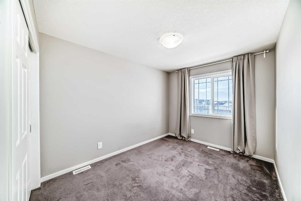 224 Carringham Way Nw, Calgary, AB - Indoor Photo Showing Other Room