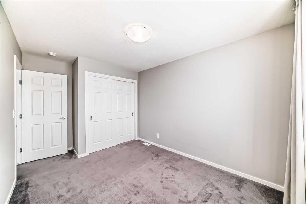 224 Carringham Way Nw, Calgary, AB - Indoor Photo Showing Other Room
