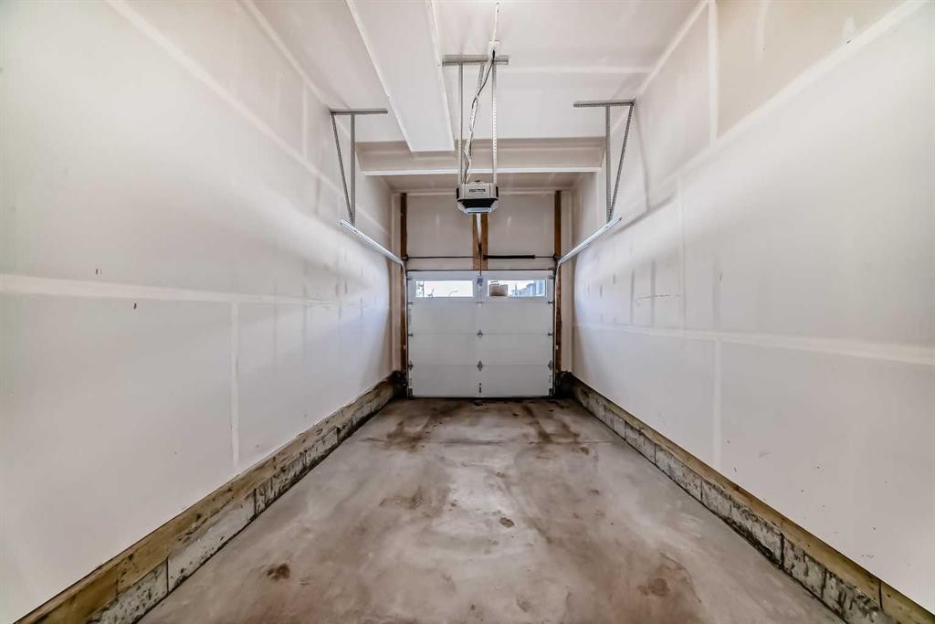 224 Carringham Way Nw, Calgary, AB - Indoor Photo Showing Garage