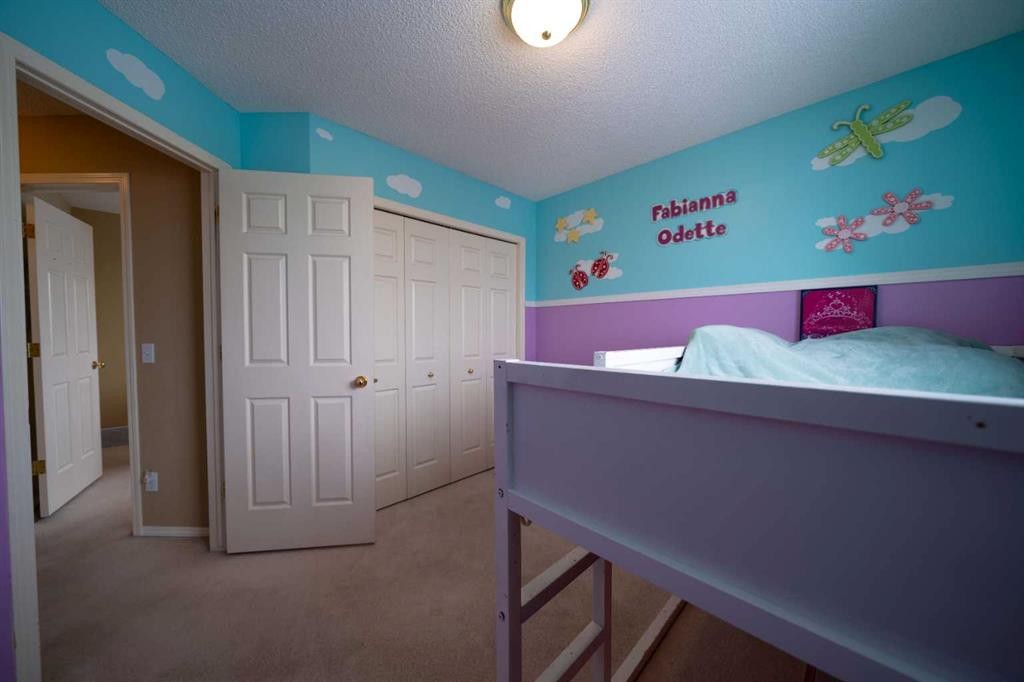 11 Arbour Stone Crescent Nw, Calgary, AB - Indoor Photo Showing Bedroom