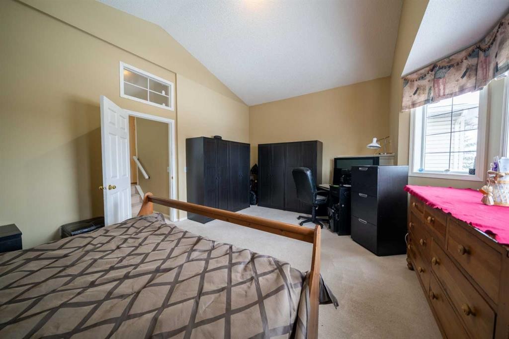 11 Arbour Stone Crescent Nw, Calgary, AB - Indoor Photo Showing Bedroom