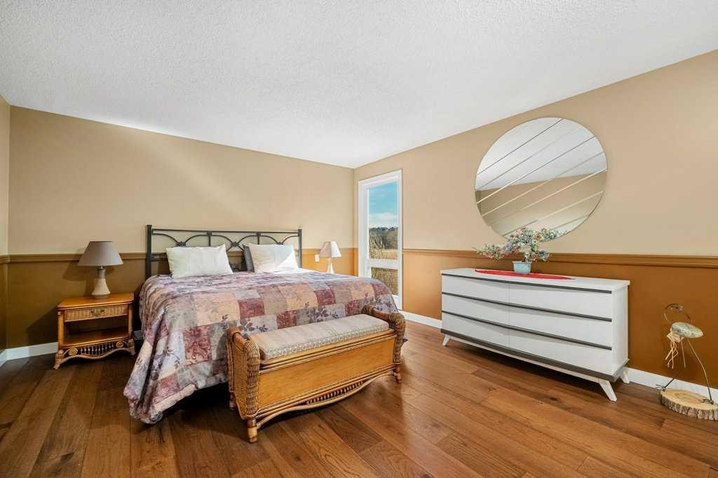 44 Deerbrook Crescent Se, Calgary, AB - Indoor Photo Showing Bedroom