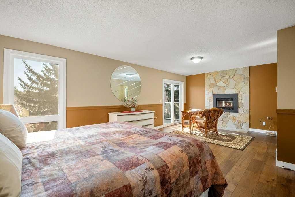 44 Deerbrook Crescent Se, Calgary, AB - Indoor With Fireplace