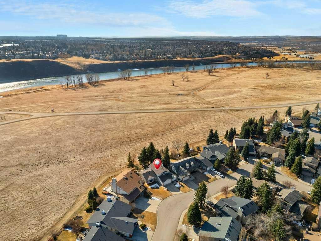 44 Deerbrook Crescent Se, Calgary, AB - Outdoor With Body Of Water With View
