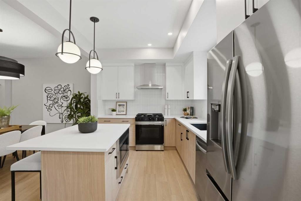 68 Buffaloberry Manor Se, Calgary, AB - Indoor Photo Showing Kitchen With Upgraded Kitchen