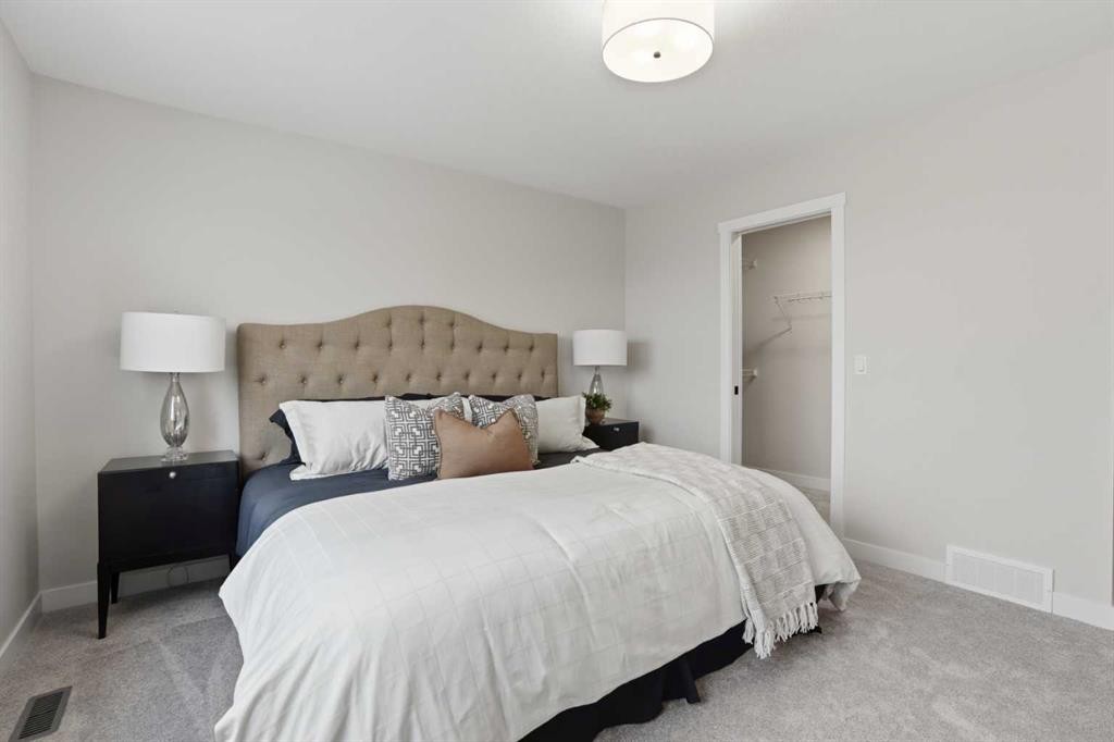 68 Buffaloberry Manor Se, Calgary, AB - Indoor Photo Showing Bedroom