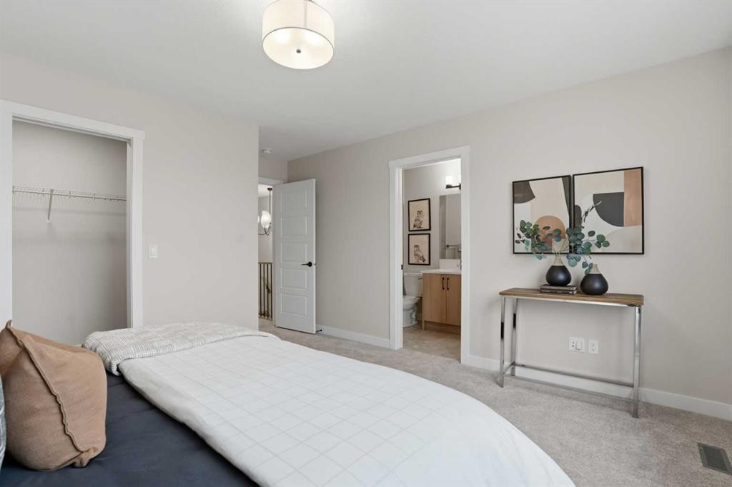 68 Buffaloberry Manor Se, Calgary, AB - Indoor Photo Showing Bedroom