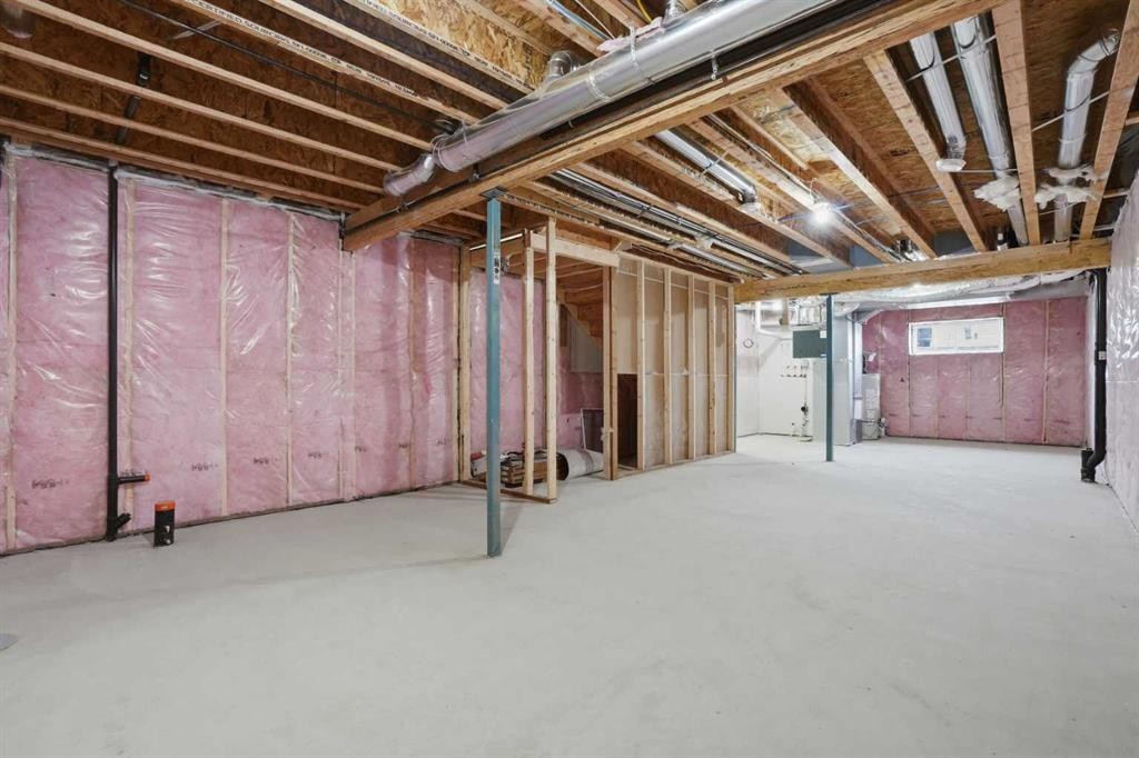 68 Buffaloberry Manor Se, Calgary, AB - Indoor Photo Showing Basement
