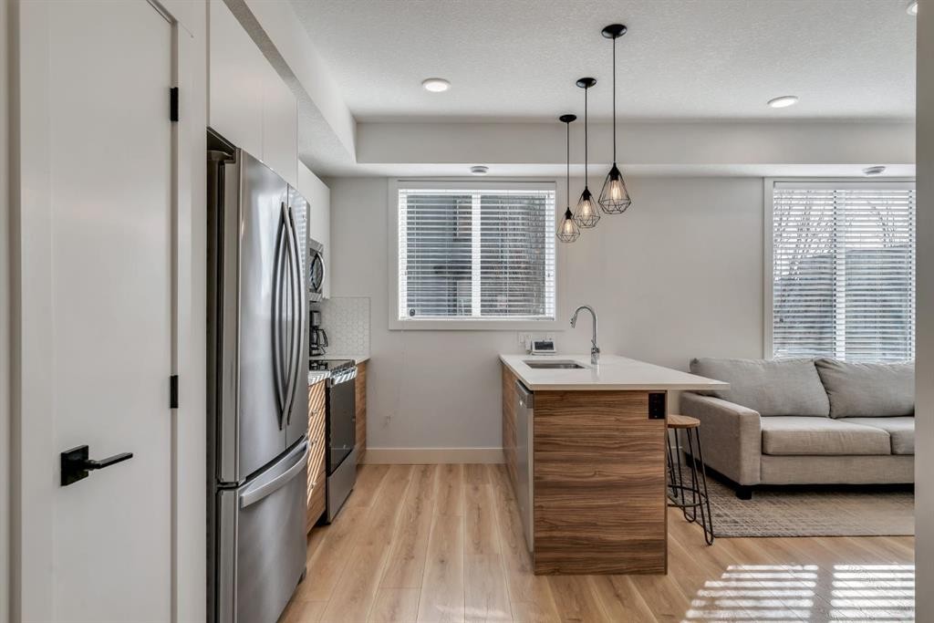 272 Seton Passage Se, Calgary, AB - Indoor Photo Showing Other Room