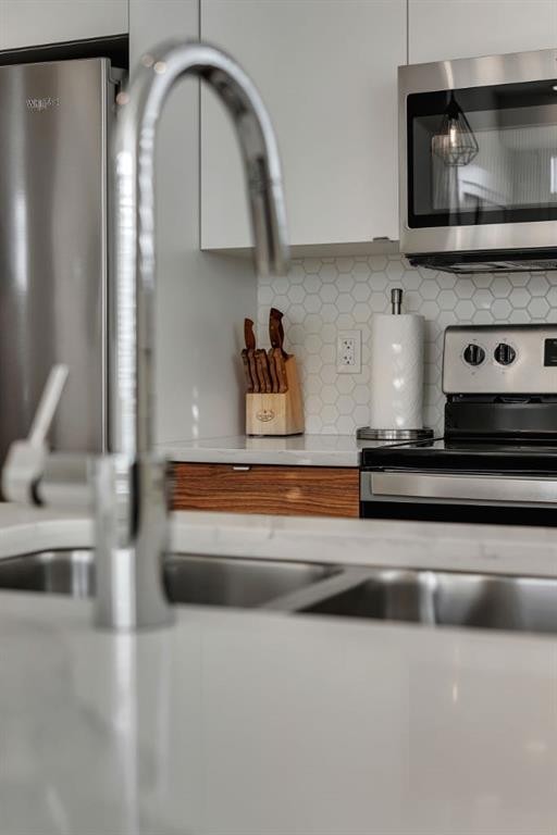 272 Seton Passage Se, Calgary, AB - Indoor Photo Showing Kitchen With Double Sink