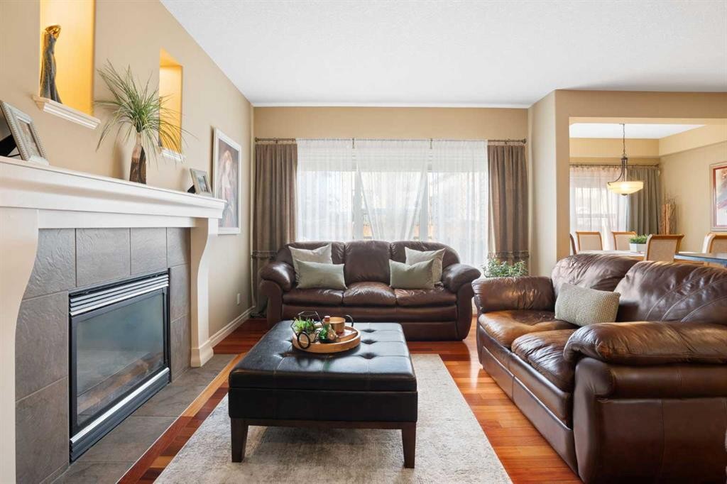 40 Bridleridge Lane Sw, Calgary, AB - Indoor Photo Showing Living Room With Fireplace