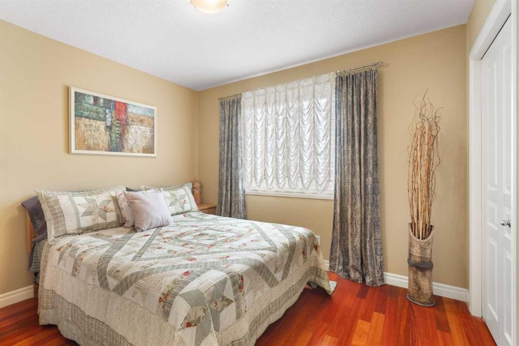 40 Bridleridge Lane Sw, Calgary, AB - Indoor Photo Showing Bedroom