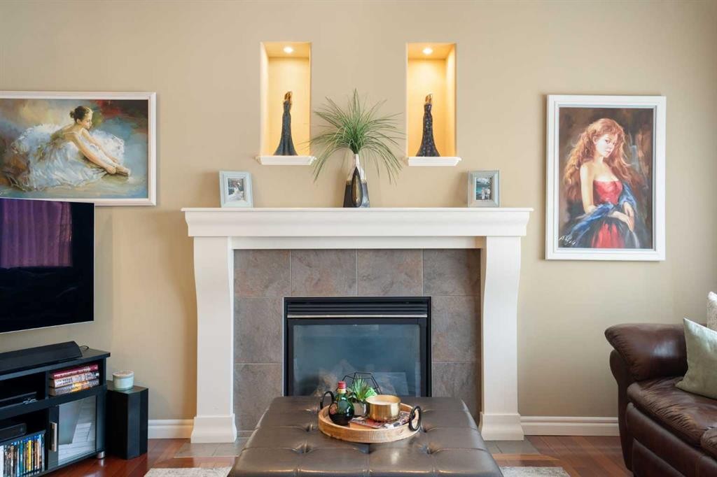 40 Bridleridge Lane Sw, Calgary, AB - Indoor Photo Showing Living Room With Fireplace