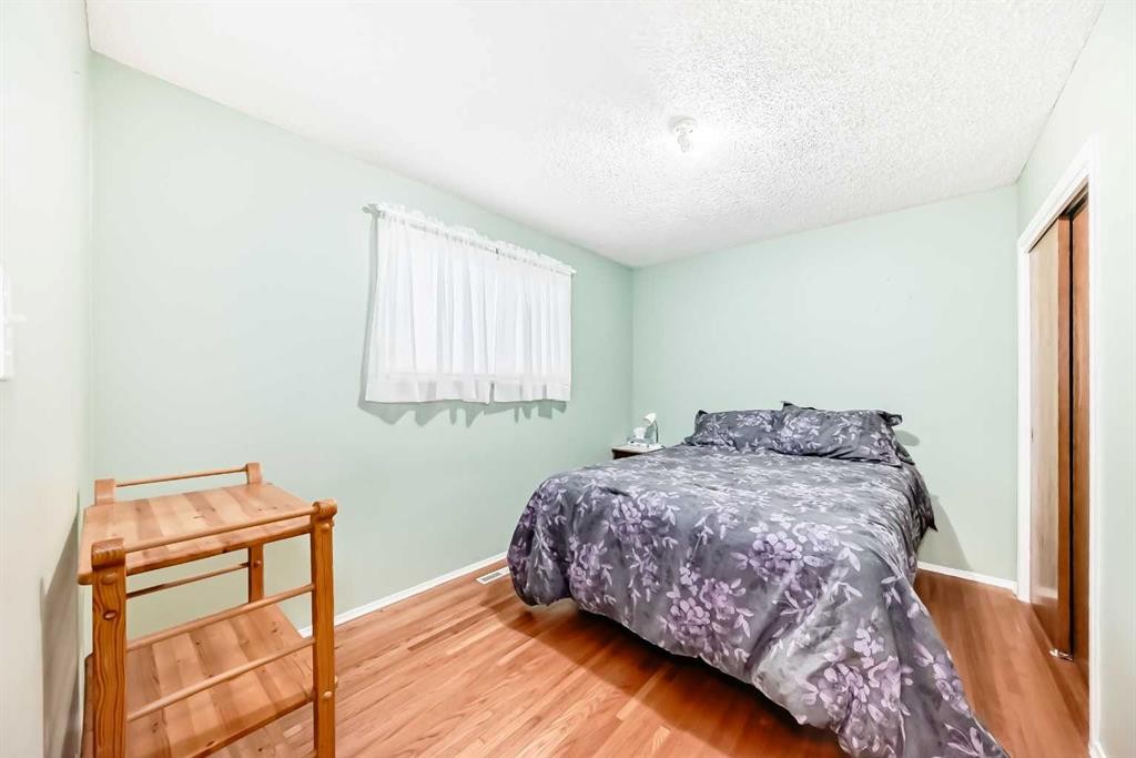 301 Whitney Crescent Se, Calgary, AB - Indoor Photo Showing Bedroom
