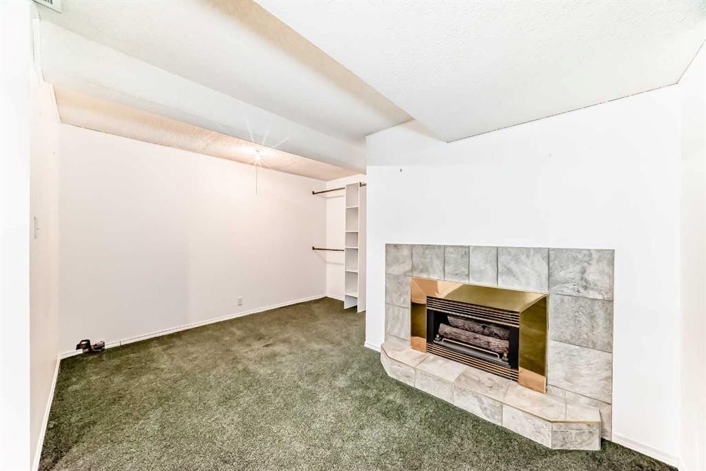 301 Whitney Crescent Se, Calgary, AB - Indoor With Fireplace
