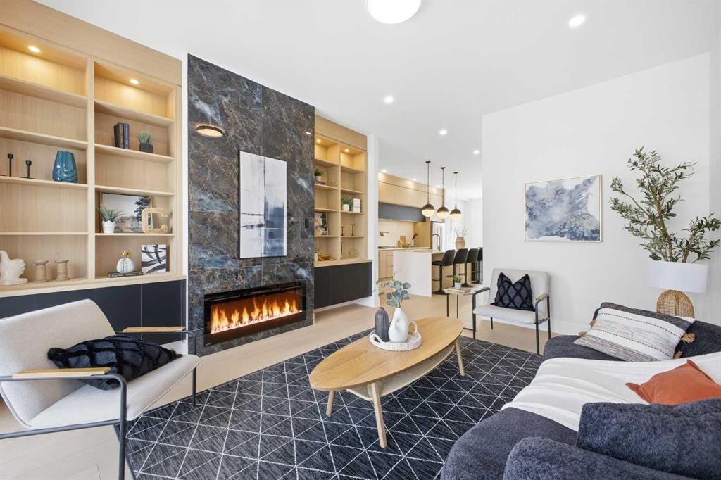 2105 7 Street Ne, Calgary, AB - Indoor With Fireplace