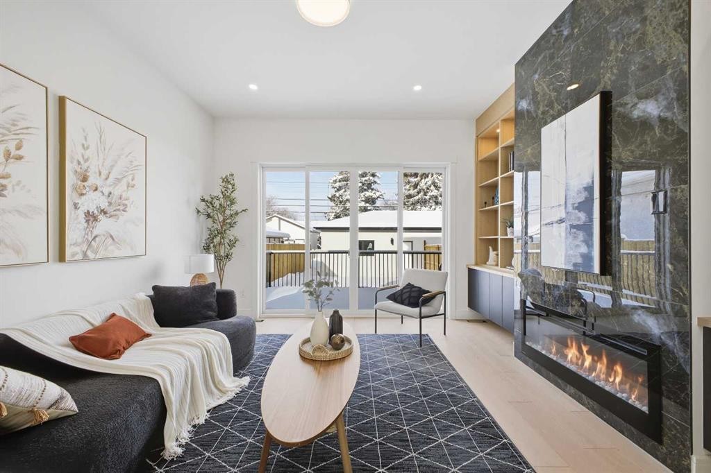 2105 7 Street Ne, Calgary, AB - Indoor Photo Showing Other Room With Fireplace