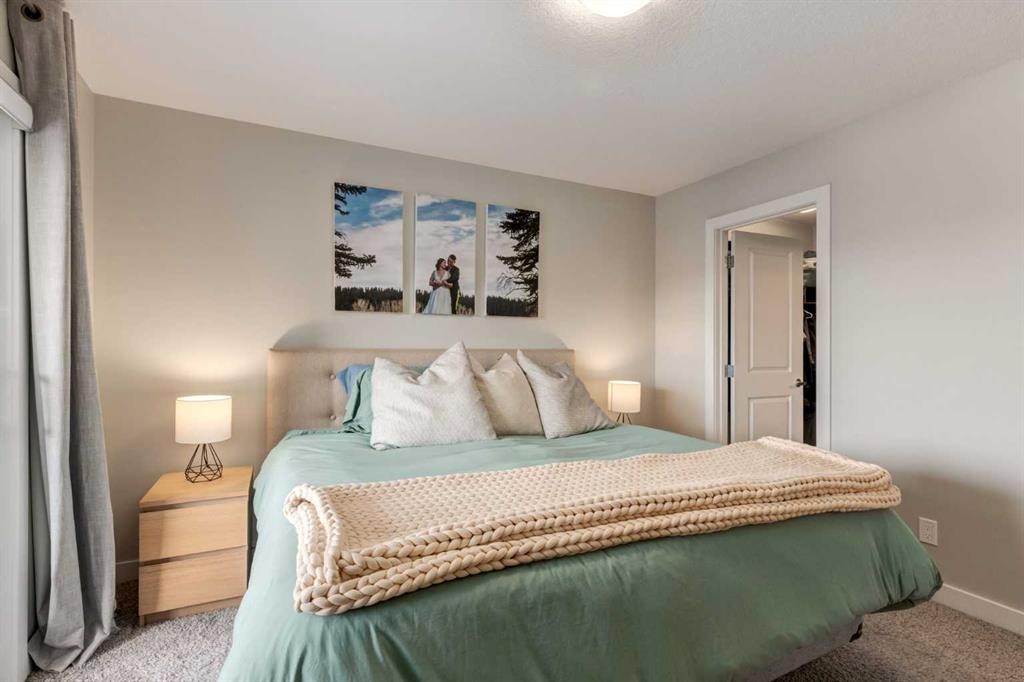 212 Crestbrook Common Sw, Calgary, AB - Indoor Photo Showing Bedroom