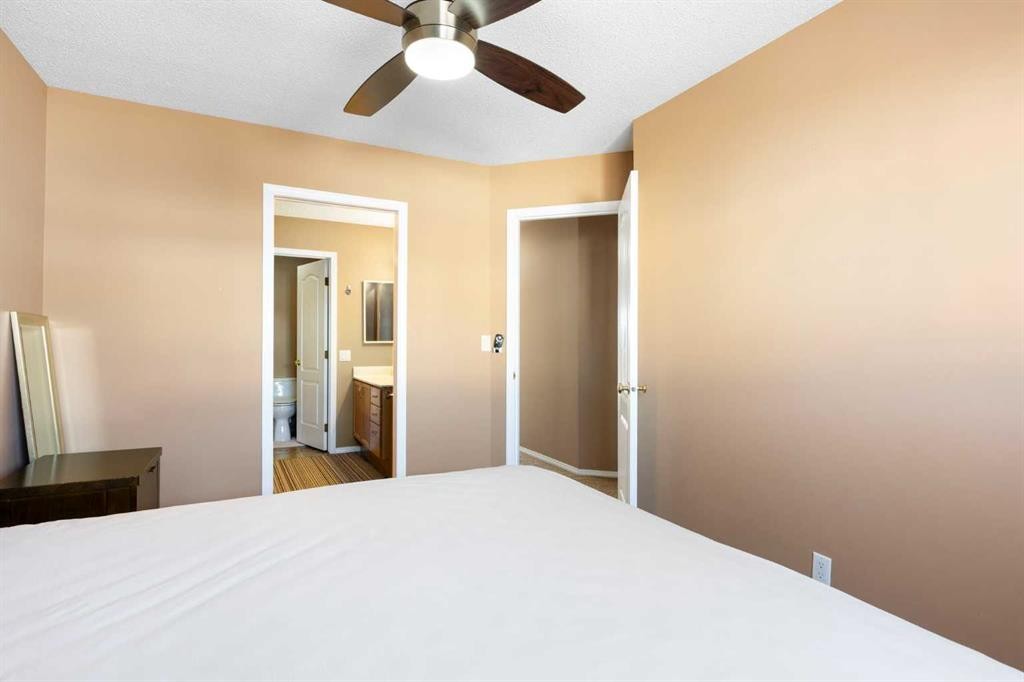 227 Bridlewood Circle Sw, Calgary, AB - Indoor Photo Showing Bedroom