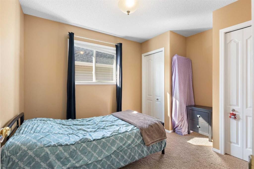 227 Bridlewood Circle Sw, Calgary, AB - Indoor Photo Showing Bedroom