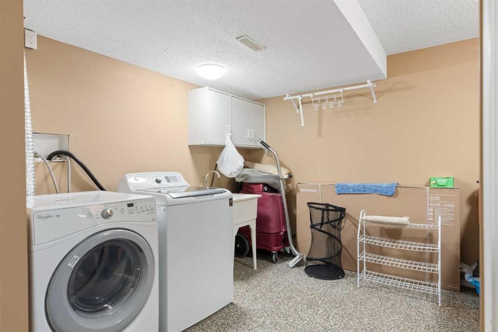 227 Bridlewood Circle Sw, Calgary, AB - Indoor Photo Showing Laundry Room