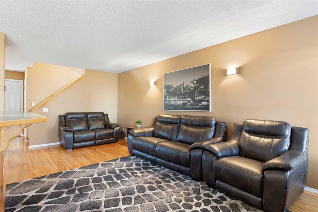 227 Bridlewood Circle Sw, Calgary, AB - Indoor Photo Showing Living Room
