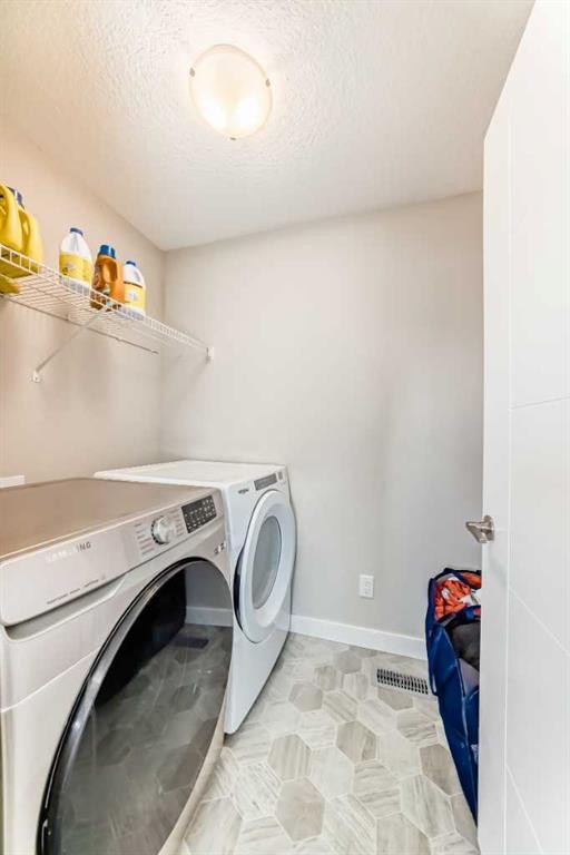 75 Howse Rise Ne, Calgary, AB - Indoor Photo Showing Laundry Room