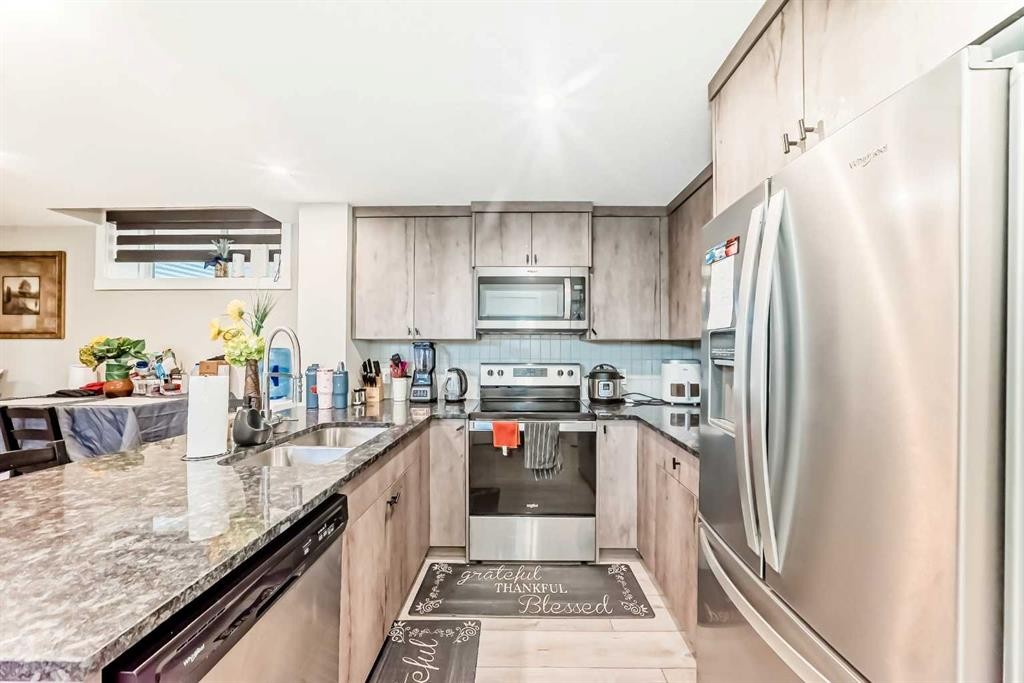 75 Howse Rise Ne, Calgary, AB - Indoor Photo Showing Kitchen With Double Sink With Upgraded Kitchen