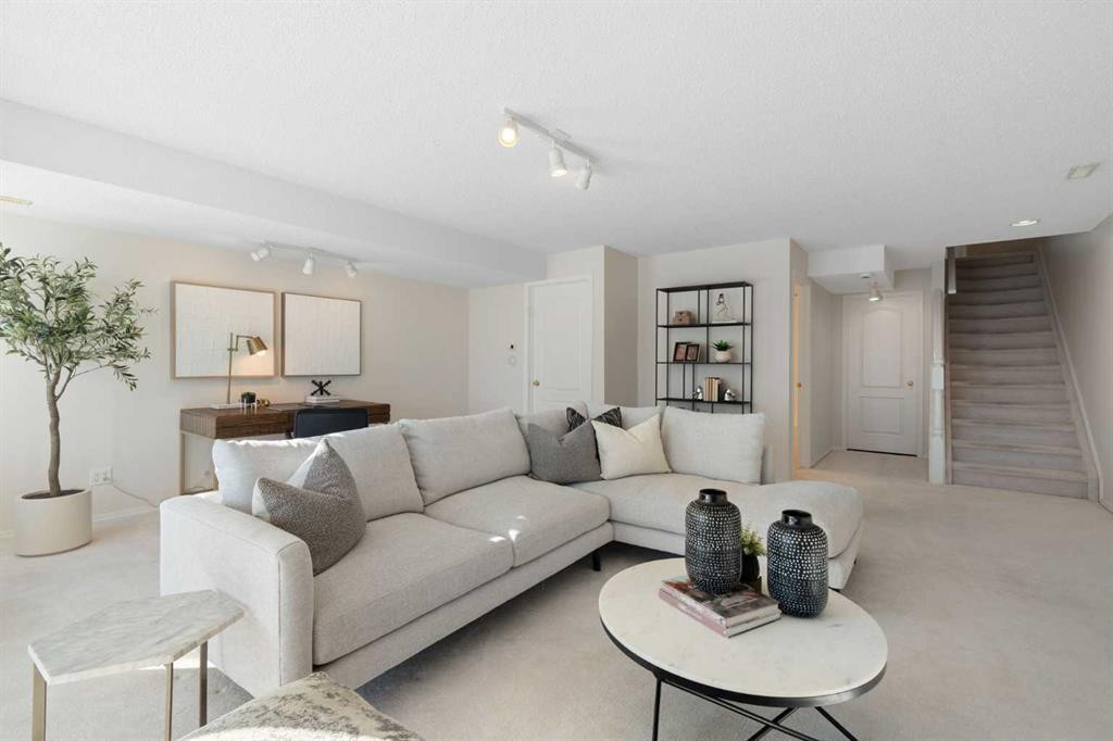 100 Hamptons Link Nw, Calgary, AB - Indoor Photo Showing Living Room