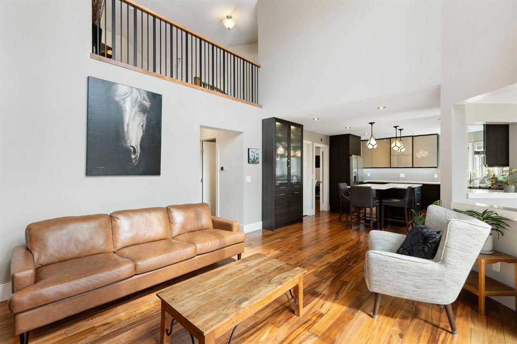 106 Shawnee Place Sw, Calgary, AB - Indoor Photo Showing Living Room