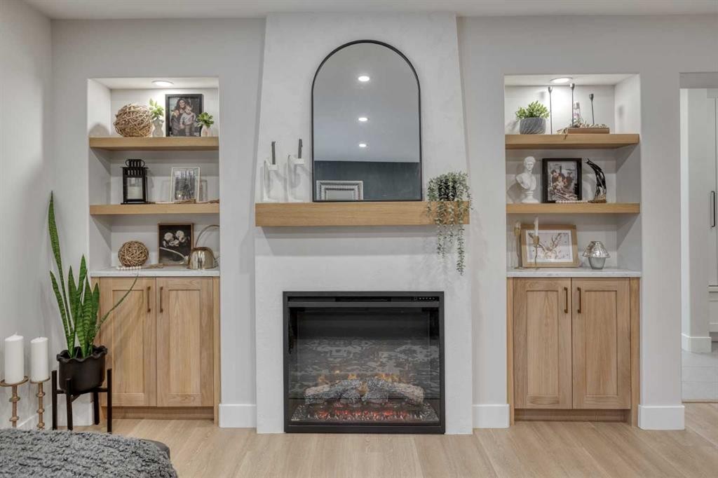 168 Oakside Circle, Calgary, AB - Indoor Photo Showing Living Room With Fireplace