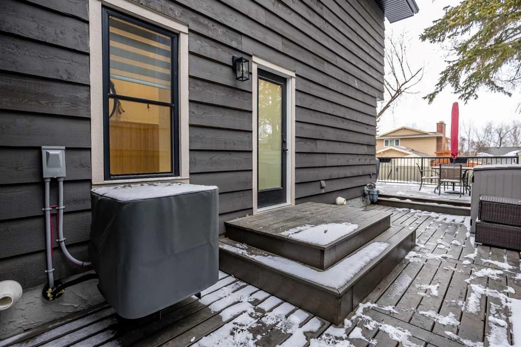 168 Oakside Circle, Calgary, AB - Outdoor With Deck Patio Veranda With Exterior